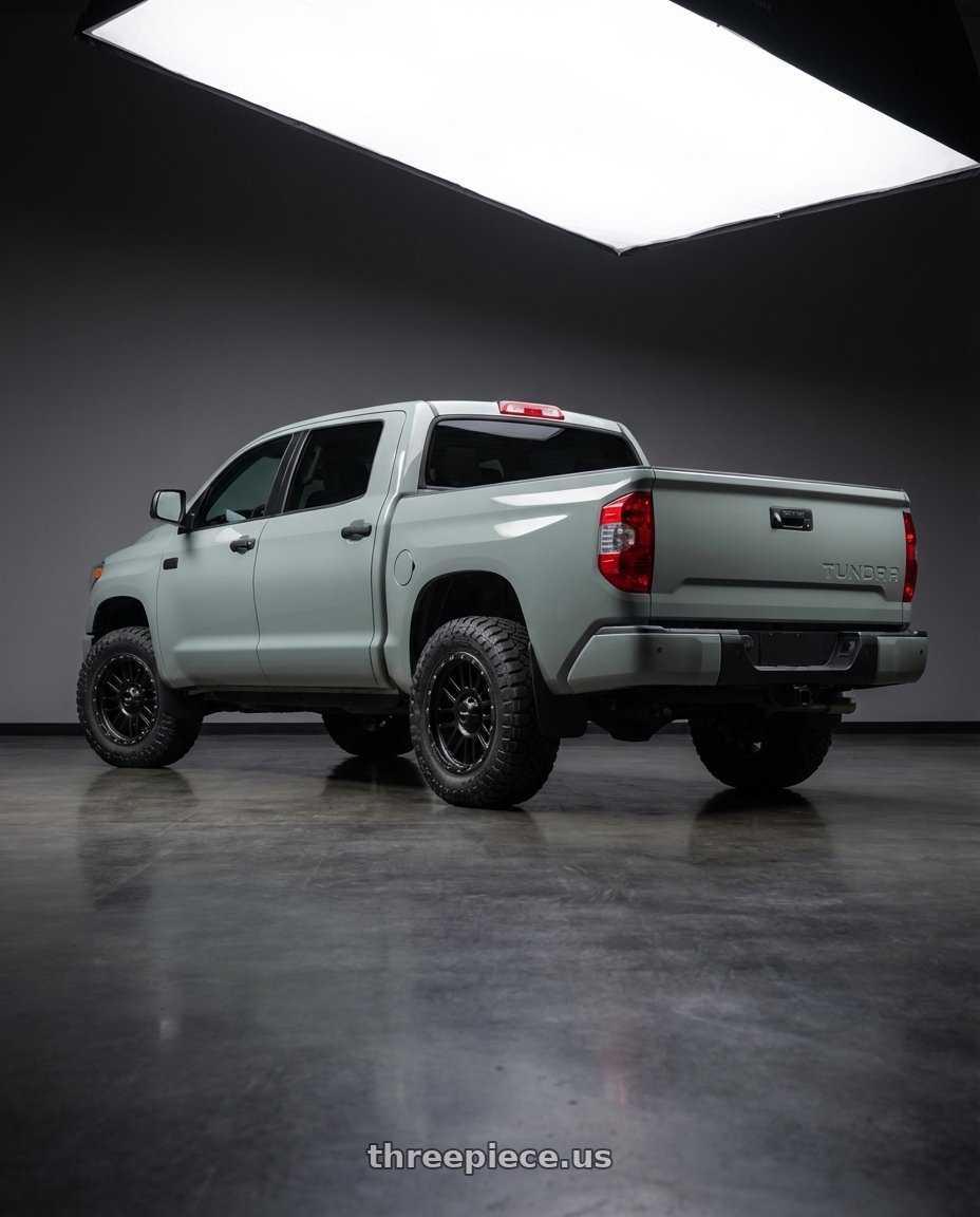 2018 Toyota Tundra with Vision Off-Road 111 Nemesis 5x150 20x9+18 Matte Black wheels rear three quarter view meaty tires