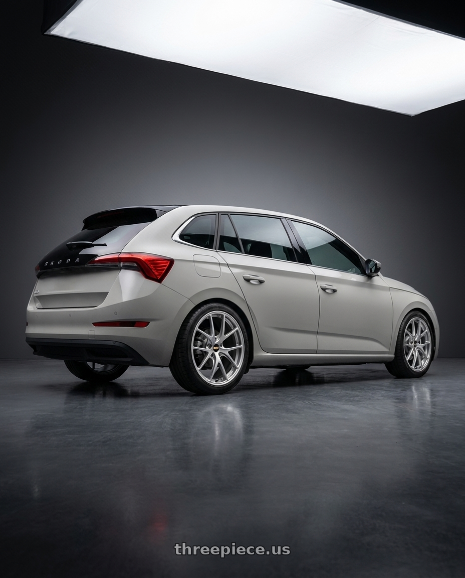 2025 skoda scala with BBS RI-A 5x100 18x9.5 +45 Diamond Silver wheels rear three quarter view square tires