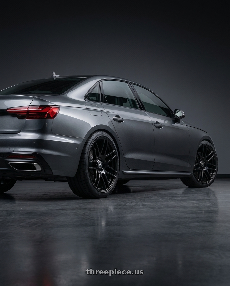 2020 Audi A4 Premium with Forgestar F14 5x112 19x8.5 +35 Gloss Black wheels rear three quarter view square tires