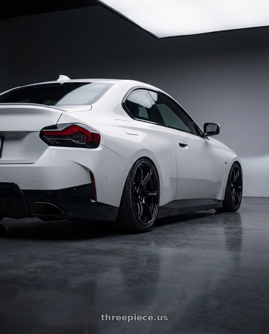 2024 BMW 2 Series G42 with Advan RGIII 5x112 19x8.5+45 Gloss Black wheels rear three quarter view slight stretch tires