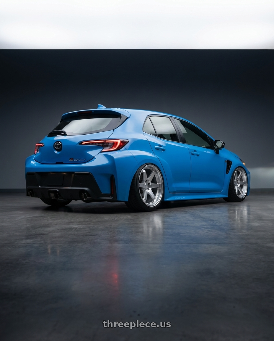 2024 Toyota GR Corolla with ESR Wheels SR SERIES SR07 5x114.3 18x9.5 +35 Hyper Silver wheels rear three quarter view slight stretch tires