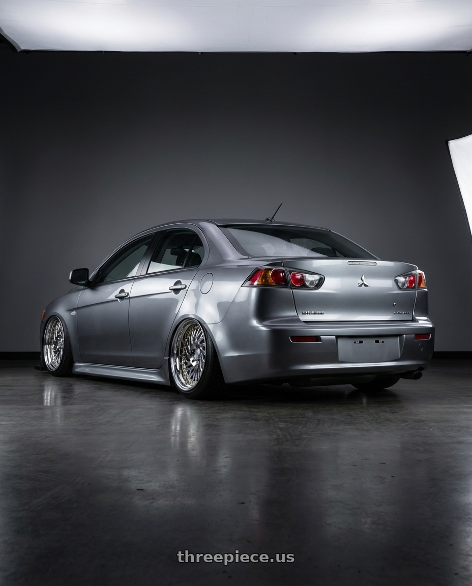 2014 Mitsubishi Lancer Ralliart with Aodhan DS03 5x114.3 18x9.5 +30 Vacuum Chrome w/Gold Rivets wheels rear three quarter view slight stretch tires