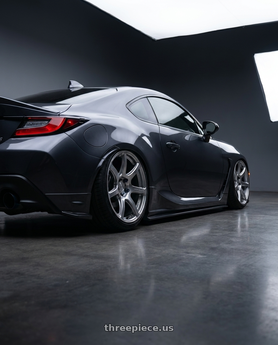 2026 toyota gr86 with Work Emotion T7r 5x100 18x8.5 +38 Gt Silver wheels rear three quarter view slight stretch tires