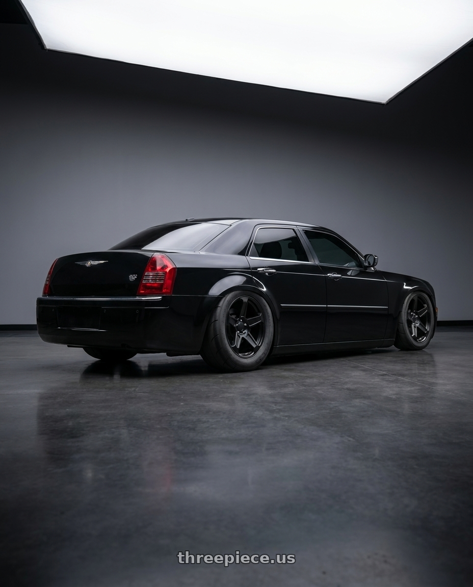 2007 Chrysler 300c with Voxx Replica Demon 5x115 20x10.5+25 Matte Black wheels rear three quarter view excessive tires