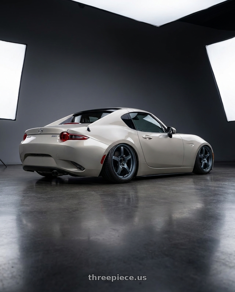 2021 Mazda MX-5 Miata ND with Gram Lights 57CR 5x114.3 17x9+38 Gunblue II wheels rear three quarter view slight stretch tires