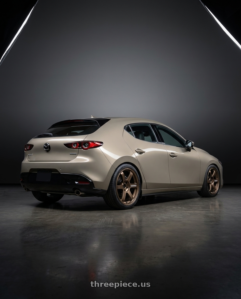 2023 Mazda 3 with Volk Racing TE37 Saga S-Plus 5x114.3 18x7.5+48 Bronze wheels rear three quarter view square tires