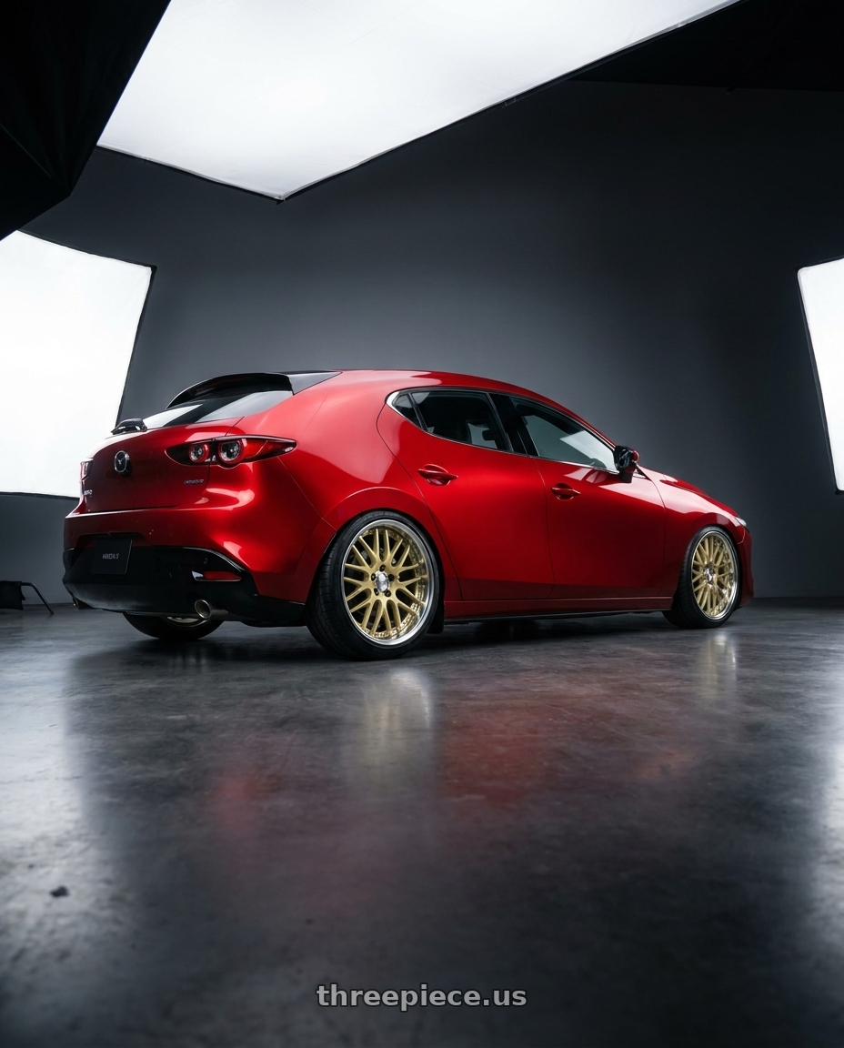 2024 Mazda 3 with Work Lanvec Lm1 5x114.3 18x9.5+0 O Disk Light Metallic Gold wheels rear three quarter view slight stretch tires