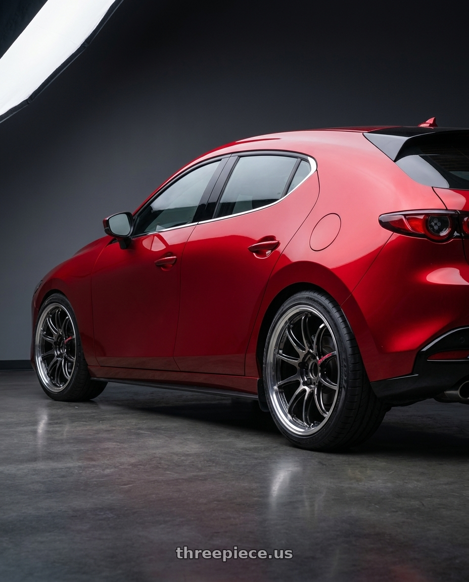 2024 Mazda 3 with Work Emotion Zr10 5x100 18x8.5 +47 Glim Black Diamond Rim cut wheels rear three quarter view slight stretch tires
