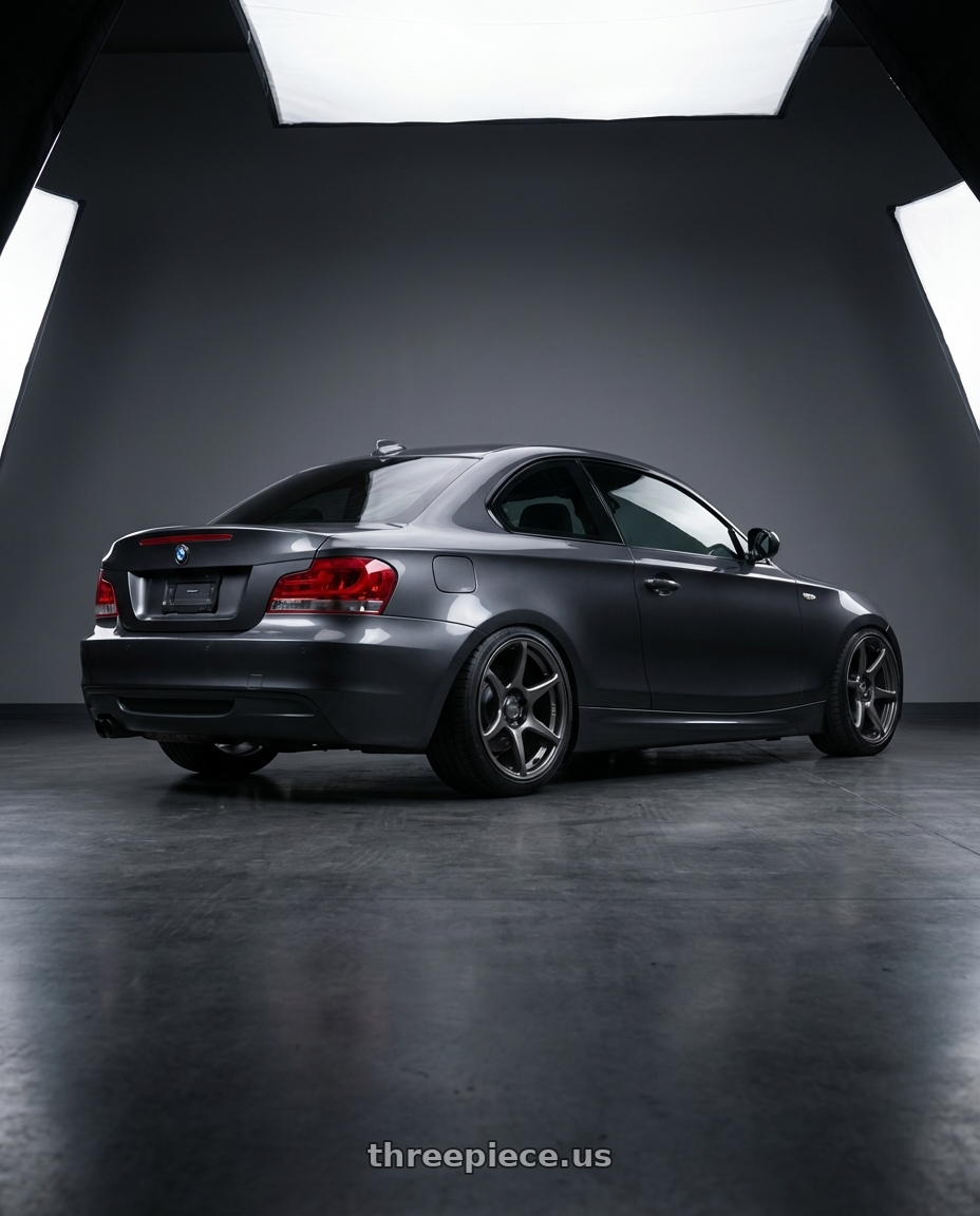 2012 BMW 1 Series E82 with Kansei K11G Tandem 5X120 18x9.5 22 Gunmetal wheels rear three quarter view square tires