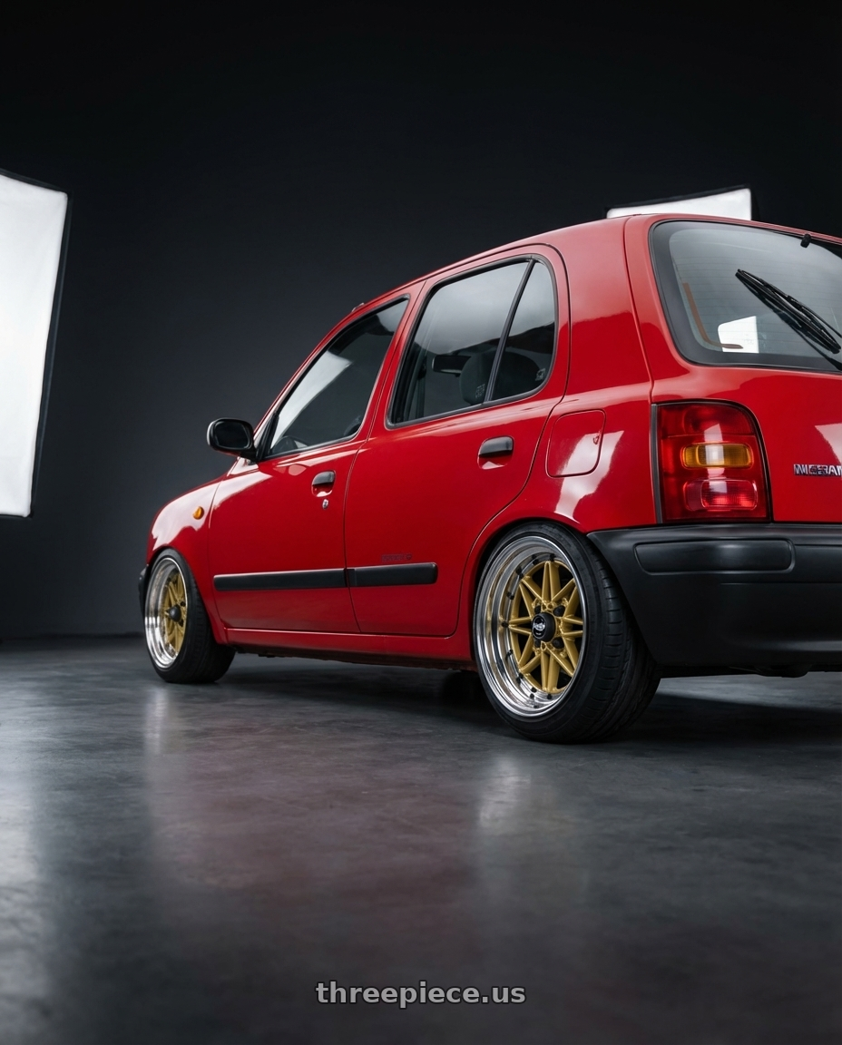 1994 Nissan micra k11 super s with EQUIP 03 GOLD 15x5.5 +26 wheels rear three quarter view slight stretch tires