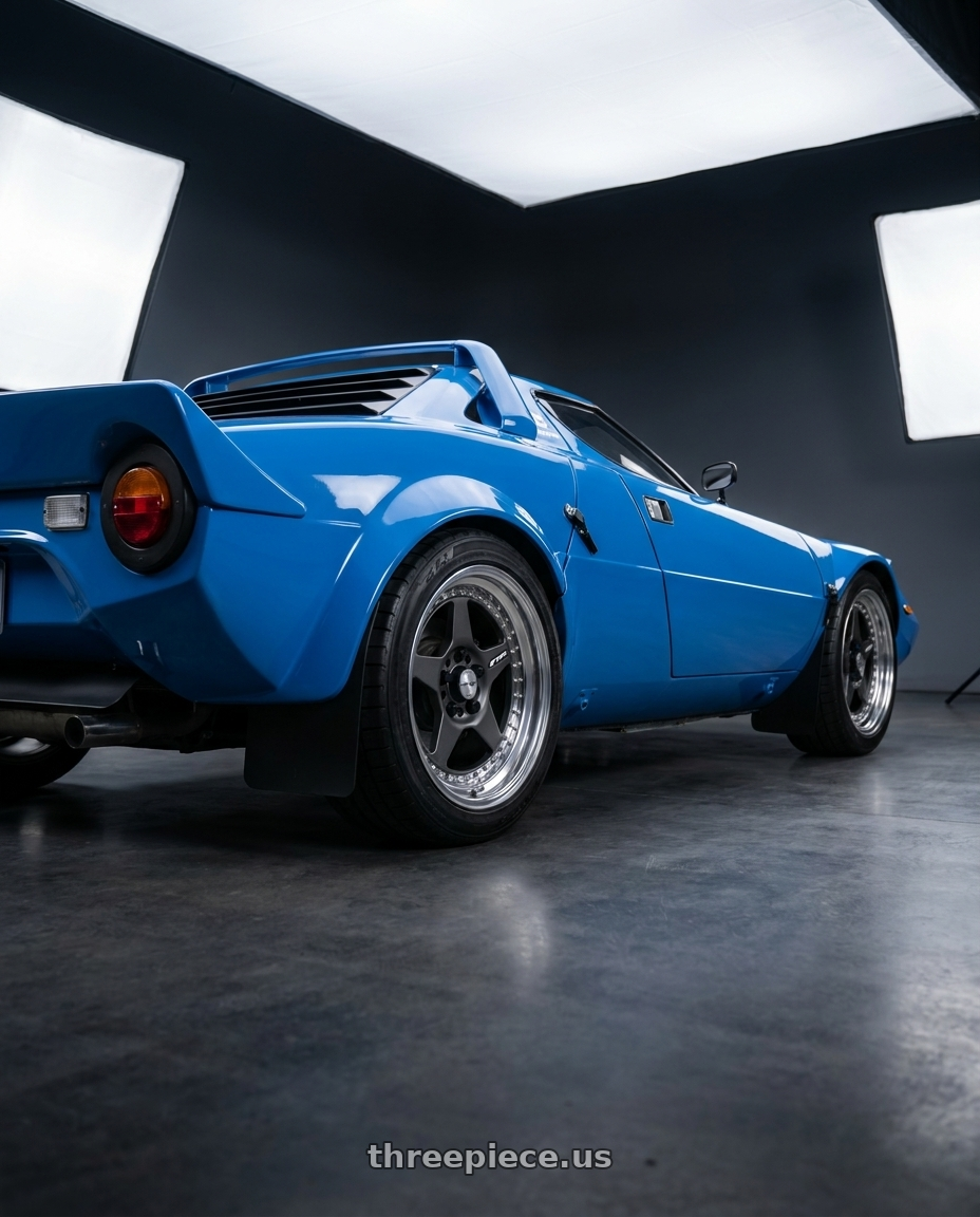 1974 Lancia Stratos with Work Meister Cr01 5x108 16x8+10 A Disk Matte Gunmetal wheels rear three quarter view square tires