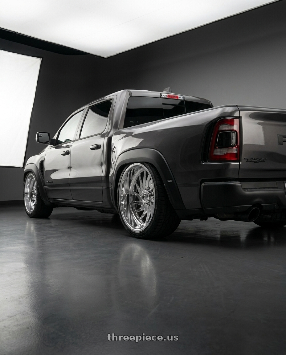2022 Dodge ram trx with Fuel Forged FF110 8x170 20x9 +0 POLISHED wheels rear three quarter view slight stretch tires