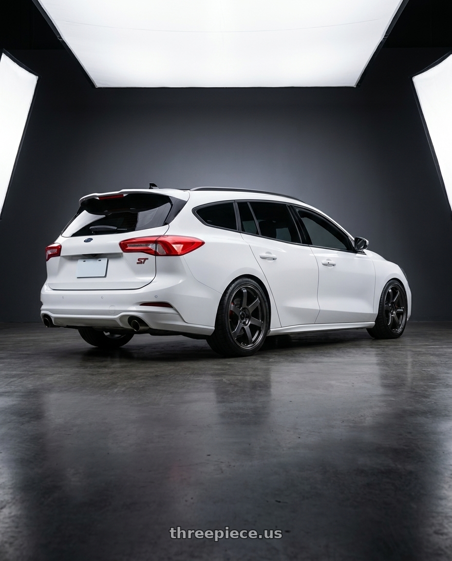 2025 ford focus wagon ST white with Volk Racing TE37 SAGA S-PLUS 5x114.3 19x10.5 +15 DIAMOND DARK GUNMETAL wheels rear three quarter view square tires