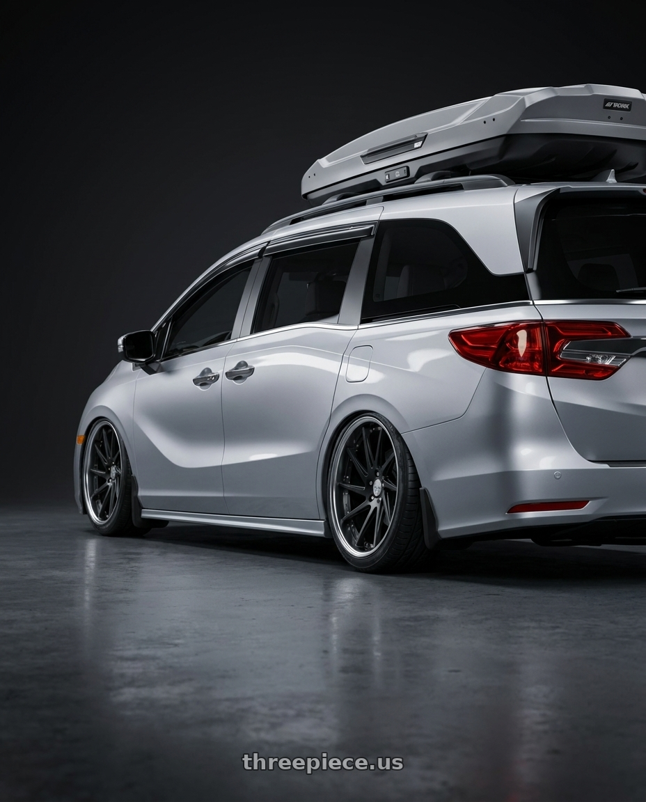 2024 Honda Odyssey with Work Gnosis Cvs 5x120 21x8.5+45 H Disk Matte Black wheels rear three quarter view slight stretch tires