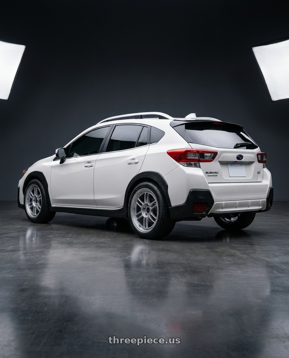 2022 SUBARU XV with Enkei RPF1 4x100 17x7+43 Silver wheels rear three quarter view square tires