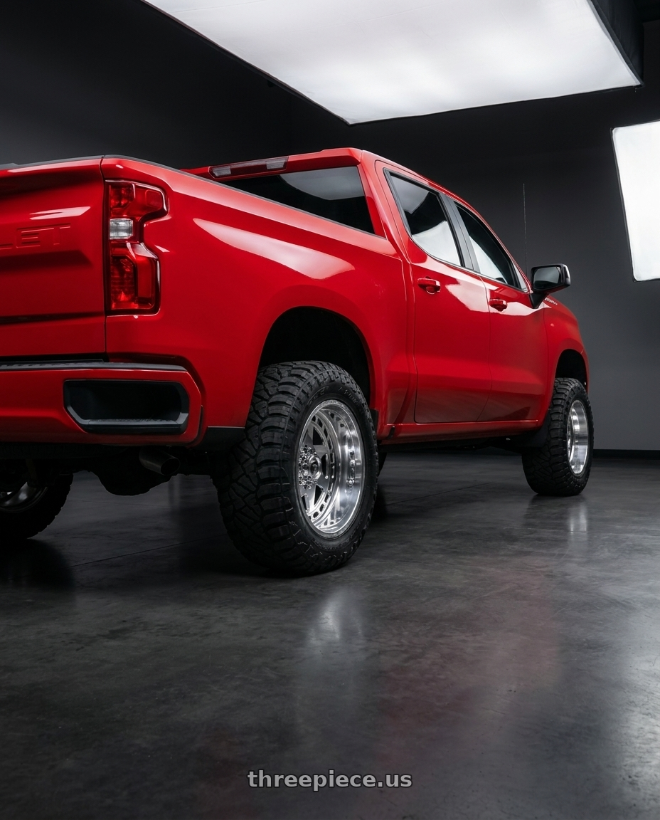 2020 chevy silverado  with Fuel Forged FF117 6x139.7 20x10 -25 POLISHED wheels rear three quarter view meaty tires