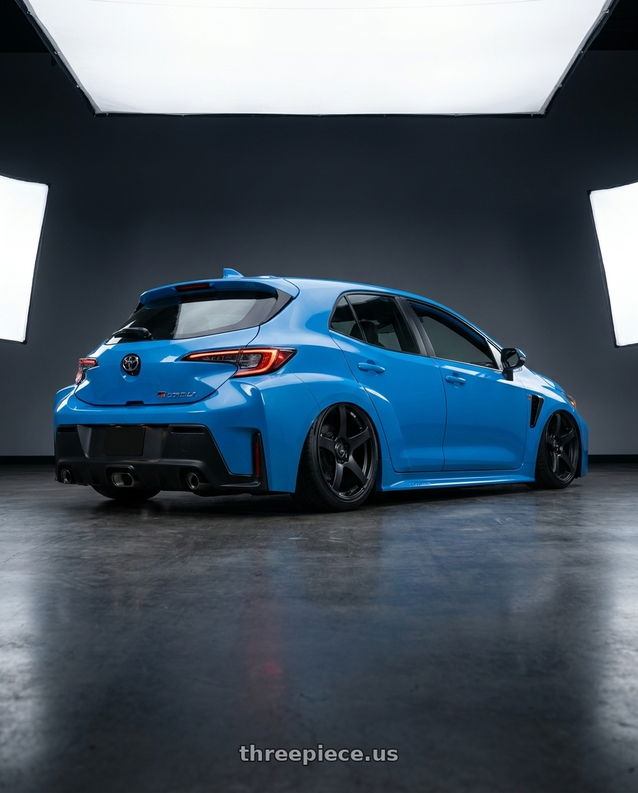 2024 Toyota GR Corolla with Ssr Gtv01 5x114.3 18x8.5+40  FLAT BLACK wheels rear three quarter view slight stretch tires