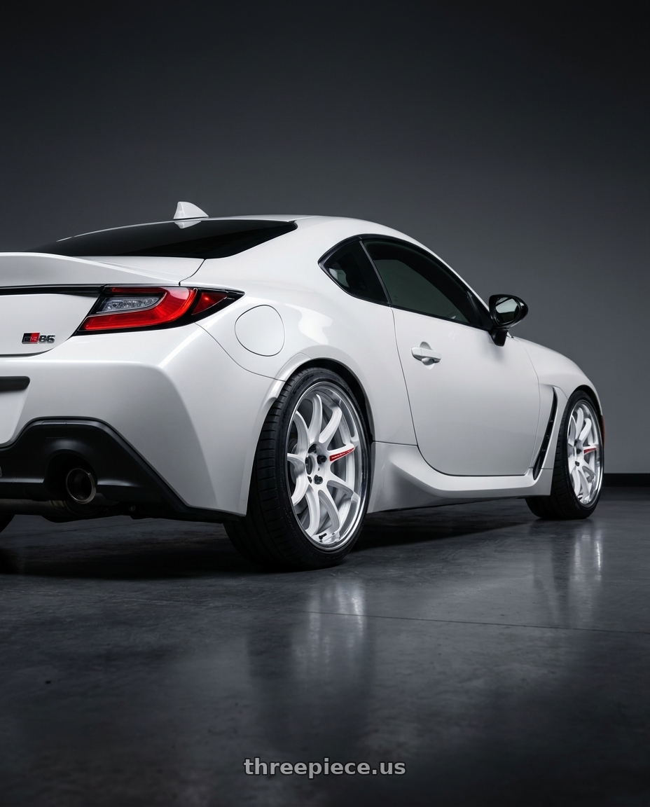 2026 toyota gr86 with Work Zr10 2P 5x100 18x8.5 +38 Azure White wheels rear three quarter view square tires