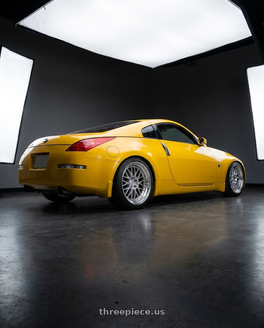 2005 nissan 350z 35th anniversary with Aodhan AH02 5x114.3 19x11+22 Silver w/ Machined Lip wheels rear three quarter view square tires