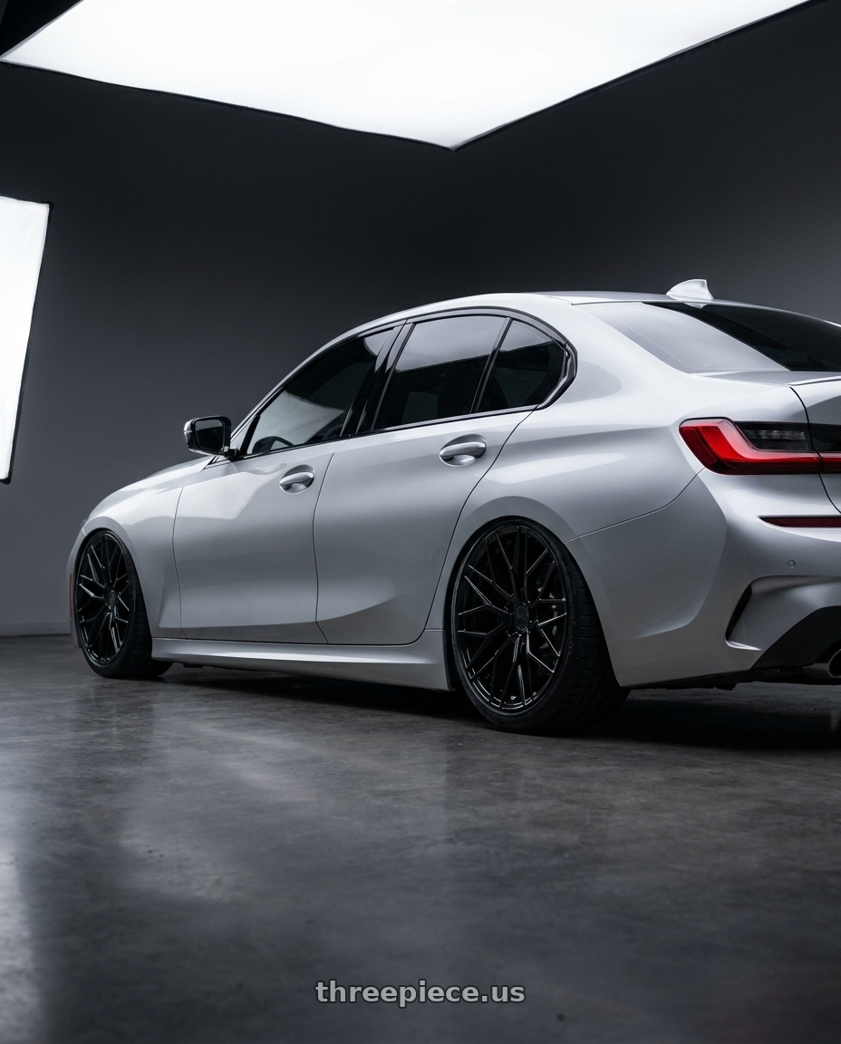 2023 BMW 3 Series G20 with Avant Garde Wheels M520R 5X112 19x9.5 +40 Gloss Black wheels rear three quarter view slight stretch tires