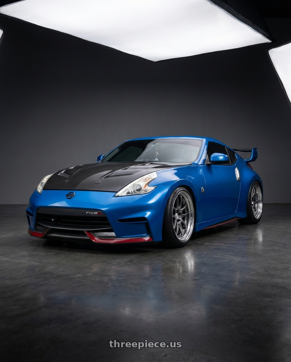 2009 Nissan 370Z with Work Cr 2P 5x114.3 19x9.5 +12 GT Silver wheels front three quarter view lowered stance