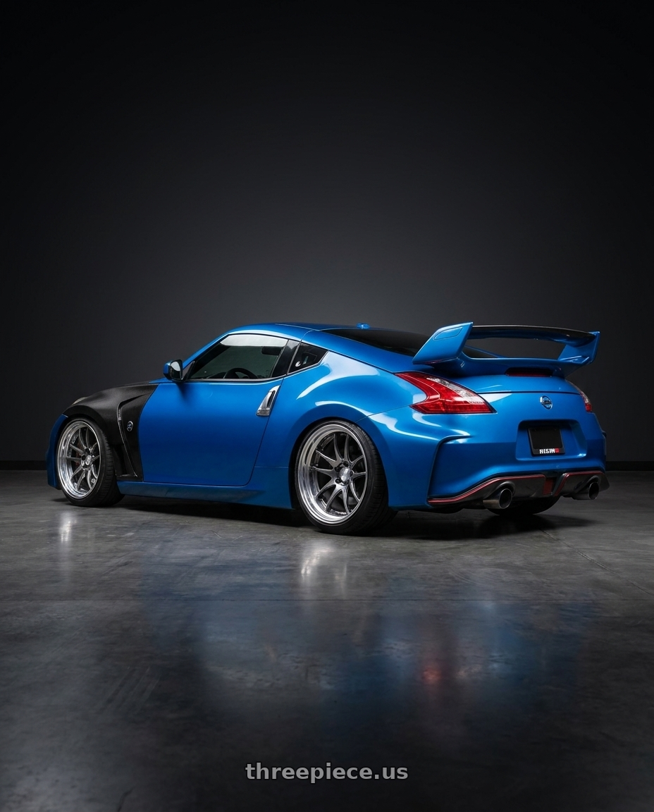 2009 Nissan 370Z with Work Cr 2P 5x114.3 19x9.5 +12 GT Silver wheels rear three quarter view slight stretch tires