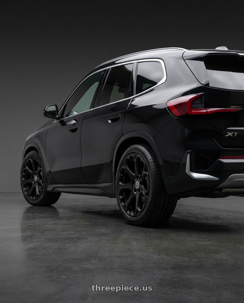 2023 BMW x1 with Heritage Wheel Kokoro MonoC 5X112 19x8.5+35 Black wheels rear three quarter view square tires