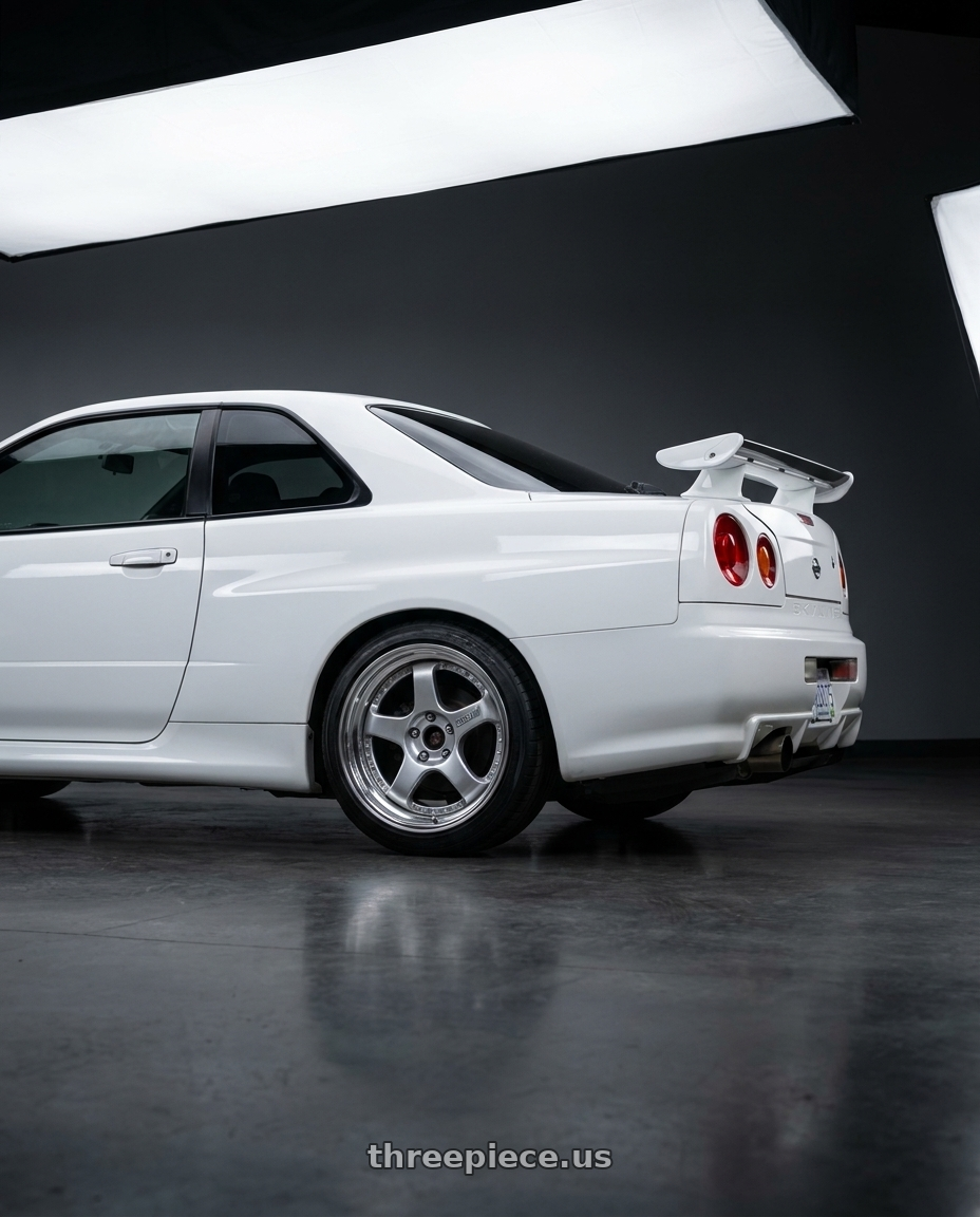 1999 Nissan Skyline with SSR Professor SP1 5x114.3 18X8+37 SL Disk Silver wheels rear three quarter view slight stretch tires