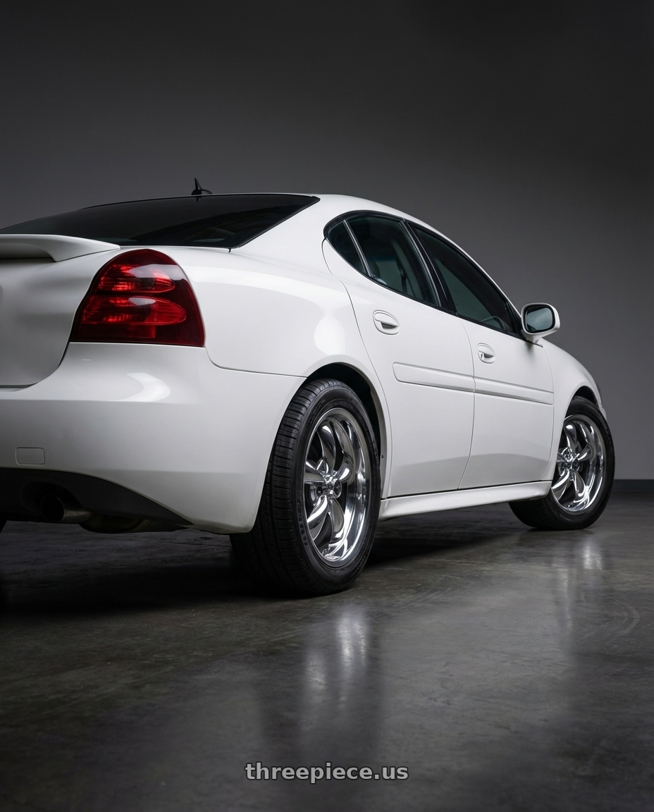 2004 Pontiac grand Prix white with American Racing AR605 TORQ THRUST M 5X100 16X7 +35 CHROME wheels rear three quarter view square tires