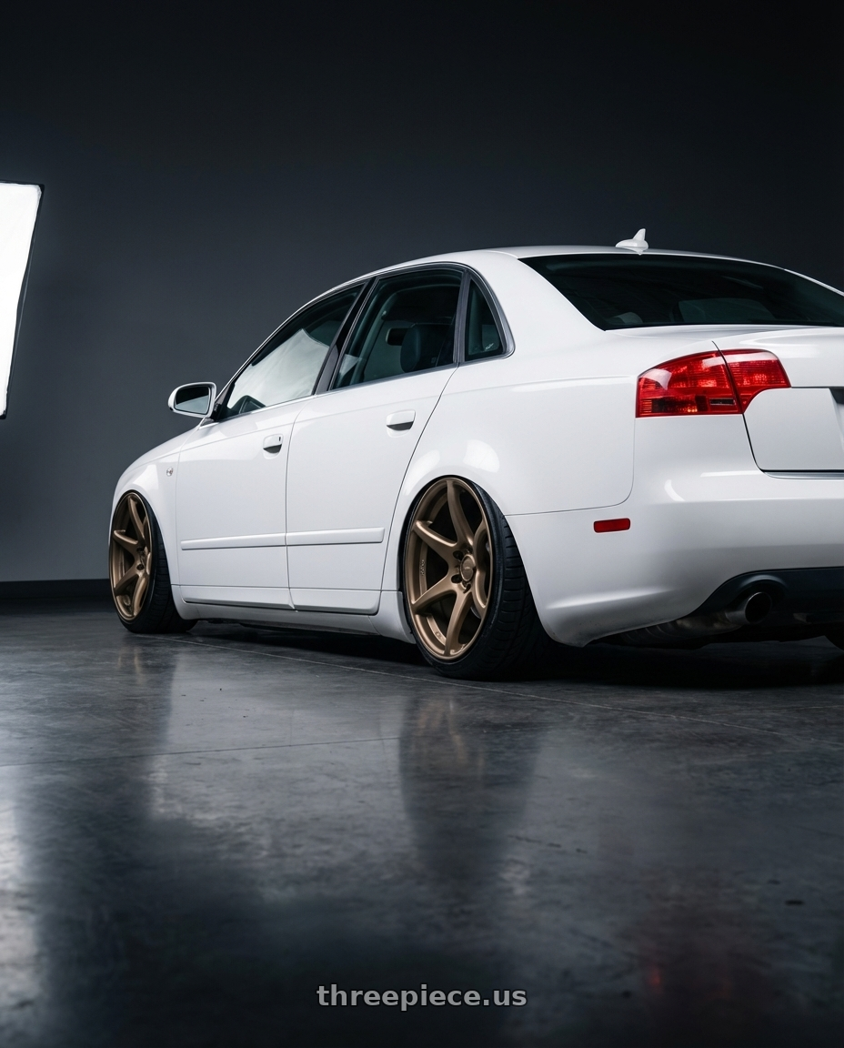 2010 Audi A4 B7 with Kansei K11B Tandem 5X112 19x10.5 22 Bronze wheels rear three quarter view slight stretch tires