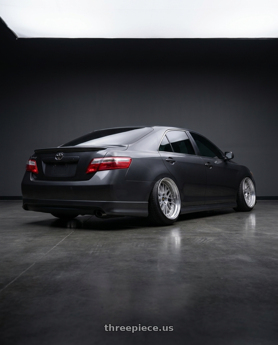 2007 Toyota Camry with Work Vs-Xx 5x114.3 20x14-33 T Disk Light Grey Silver wheels rear three quarter view extreme stretch tires