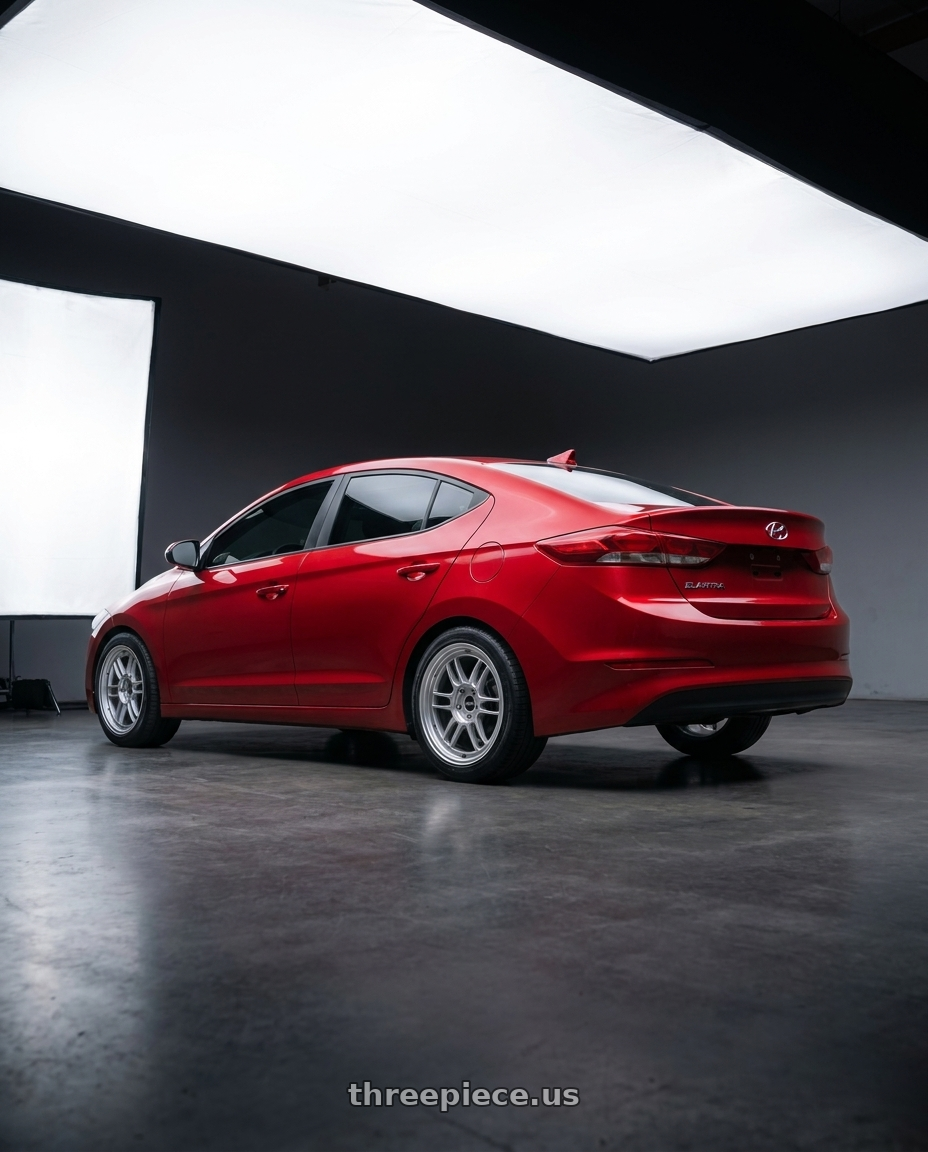 2017 Hyundai Elantra with Enkei RPF1 5x114.3 17x7.5+48 Silver wheels rear three quarter view square tires