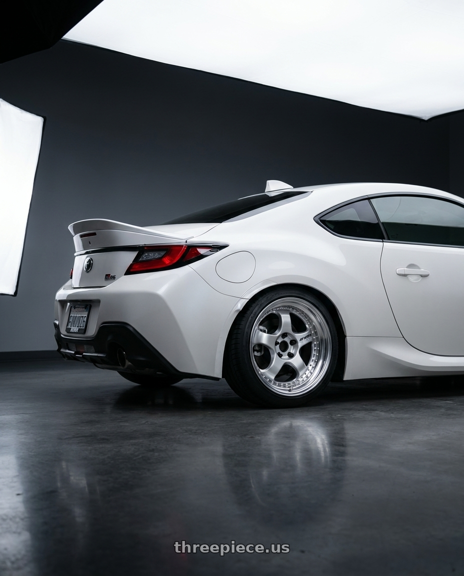 2026 Toyota gr86 with Work Meister S1 3P 5x100 18x9.5+35 L Disk Silver wheels rear three quarter view square tires