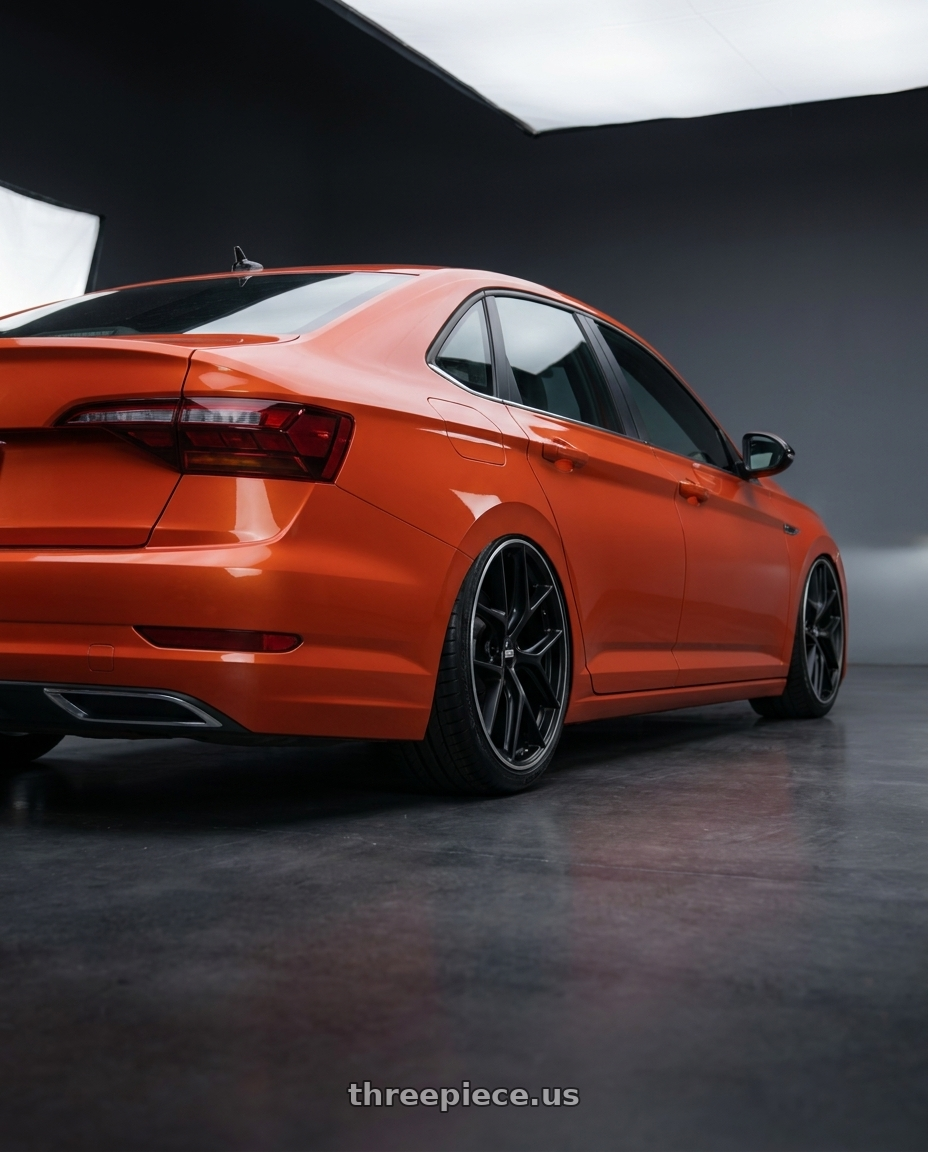2023 Volkswagen Jetta GLI MK7 with BBS CC-R 5x112 19x8.5+30 Satin Black wheels rear three quarter view slight stretch tires