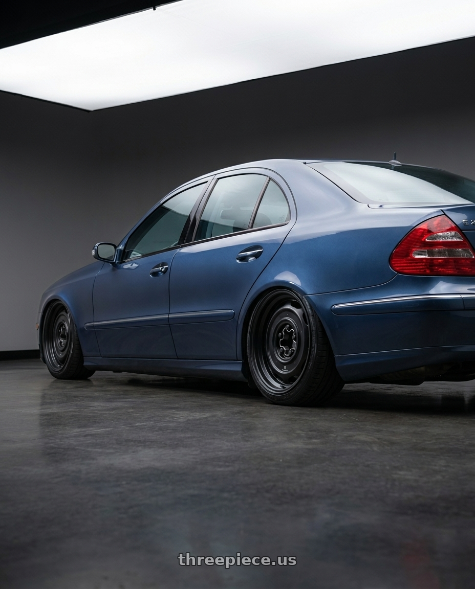 2002 Mercedes benz e240 avantgarde with Mobelwagen MW512B Interceptor 5X112 16x7.5 23 Black wheels rear three quarter view slight stretch tires
