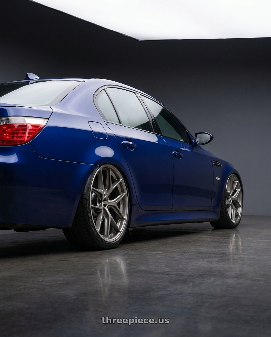 2010 BMW M5 E60 with BBS CC-R 5x120 19x9.0+48 Satin Platinum wheels rear three quarter view slight stretch tires