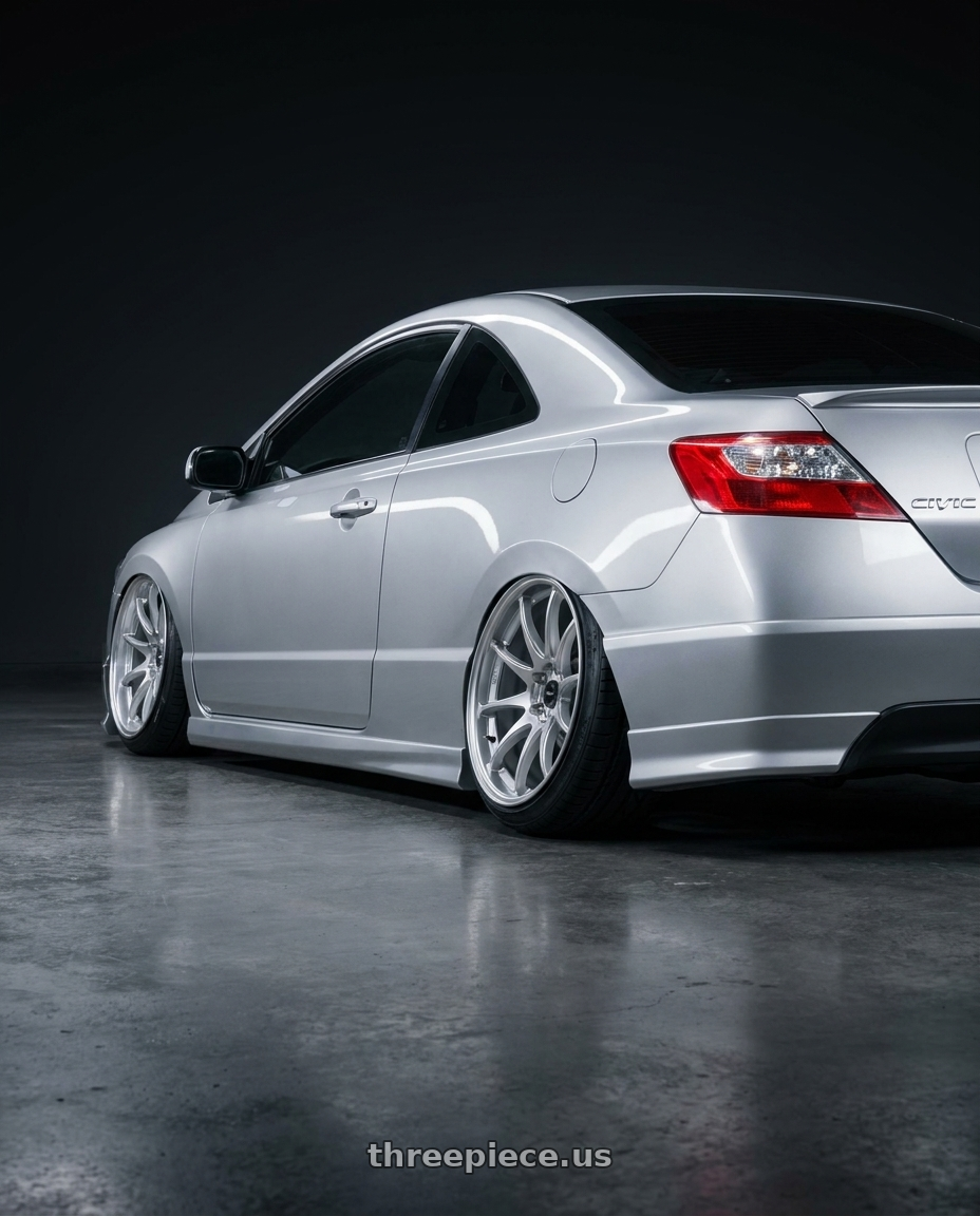 2007 Honda civic with Vors TR4 5x100 17x8  +35 Silver Machine Face wheels rear three quarter view extreme stretch tires