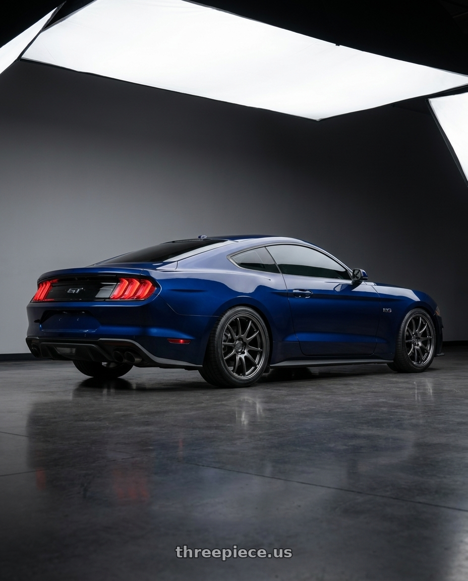 2019 ford mustang gt Kona blue  with Aodhan DS02 5x114.3 18x8.5+35 Hyper Black wheels rear three quarter view square tires