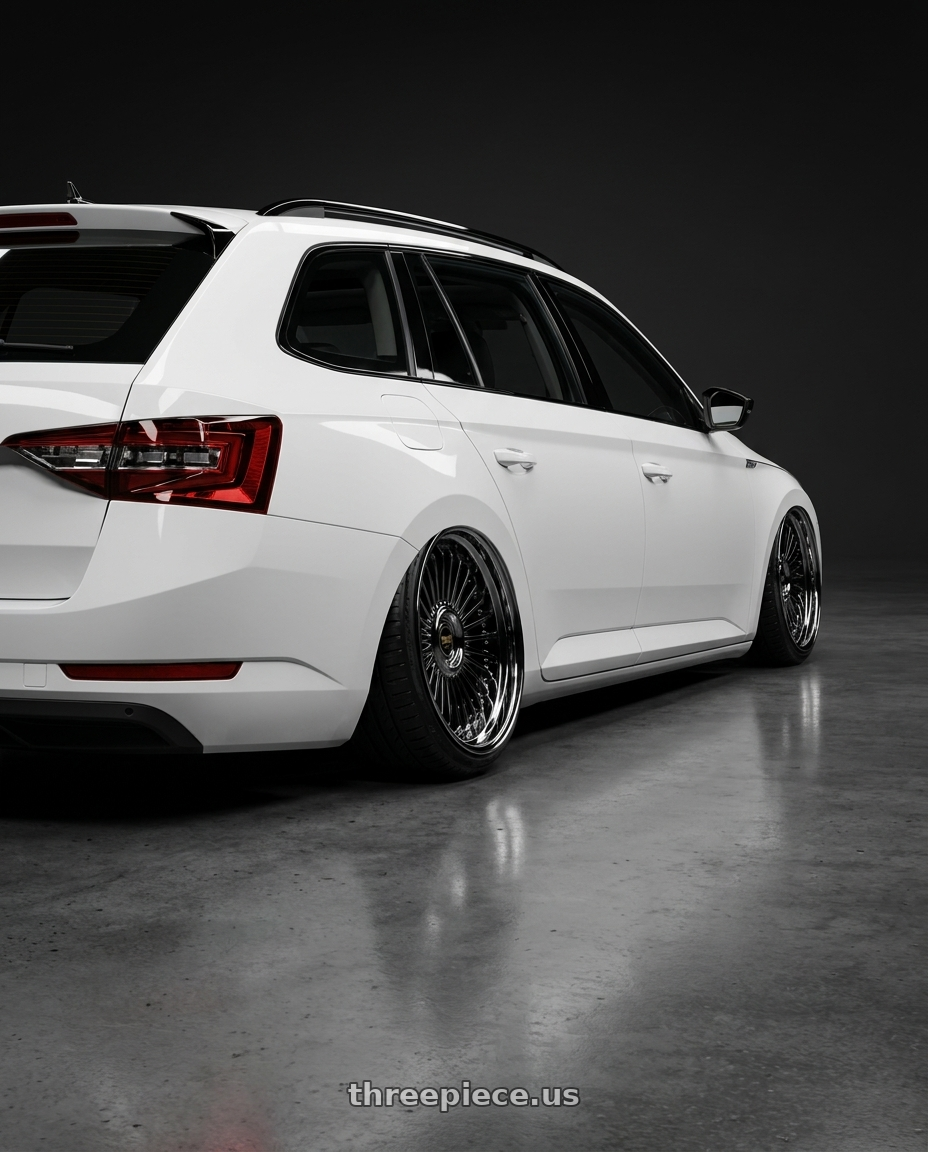 2030 superb combi with Work Emitz Black Polish 5x100 19x7.5 +45 wheels rear three quarter view slight stretch tires