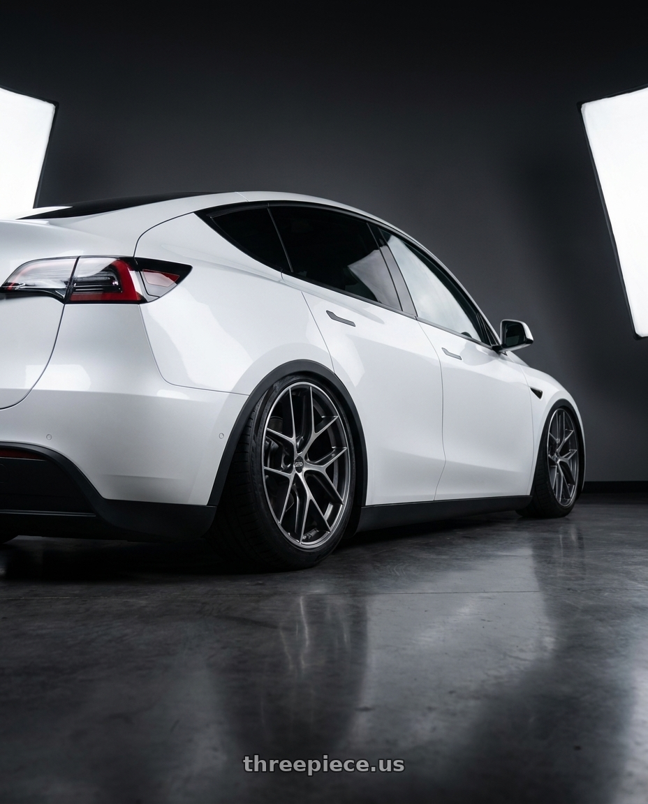 2024 Tesla Model Y with BBS CC-R 5x114.3 20x9.0+32 Graphite w/ Diamond Cut Face wheels rear three quarter view slight stretch tires