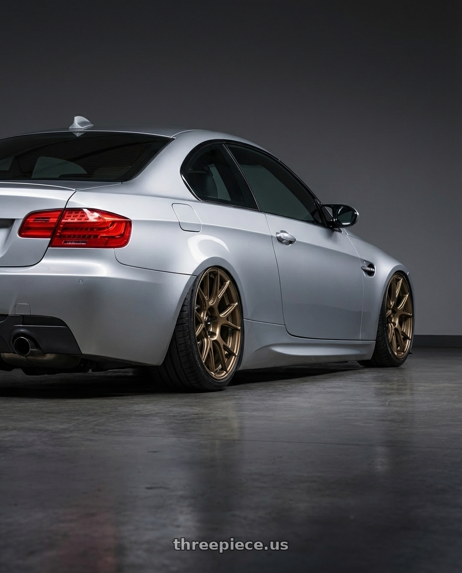 2012 BMW 3 Series E92 with Konig Ampliform 5x120 19x10+28 Gloss Bronze wheels rear three quarter view slight stretch tires