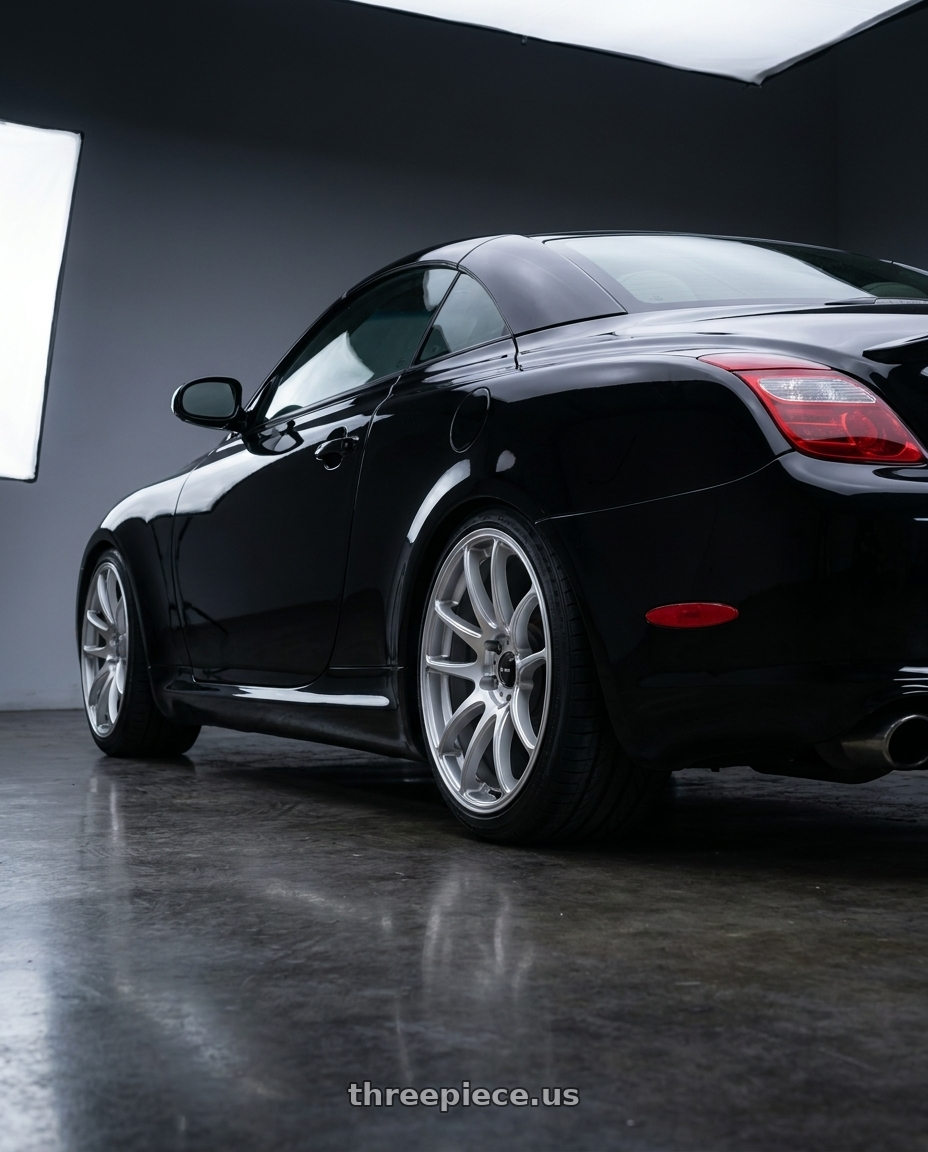 2005 lexus sc430 with Vors TR4 5x114.3 18x9.5  +22 Silver Machine Face wheels rear three quarter view square tires