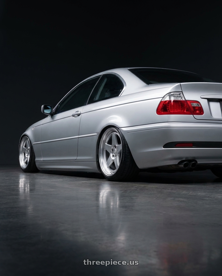2004 BMW 330Ci with Kansei K12H KNP 5X120 17x9 35 Hyper Silver wheels rear three quarter view slight stretch tires