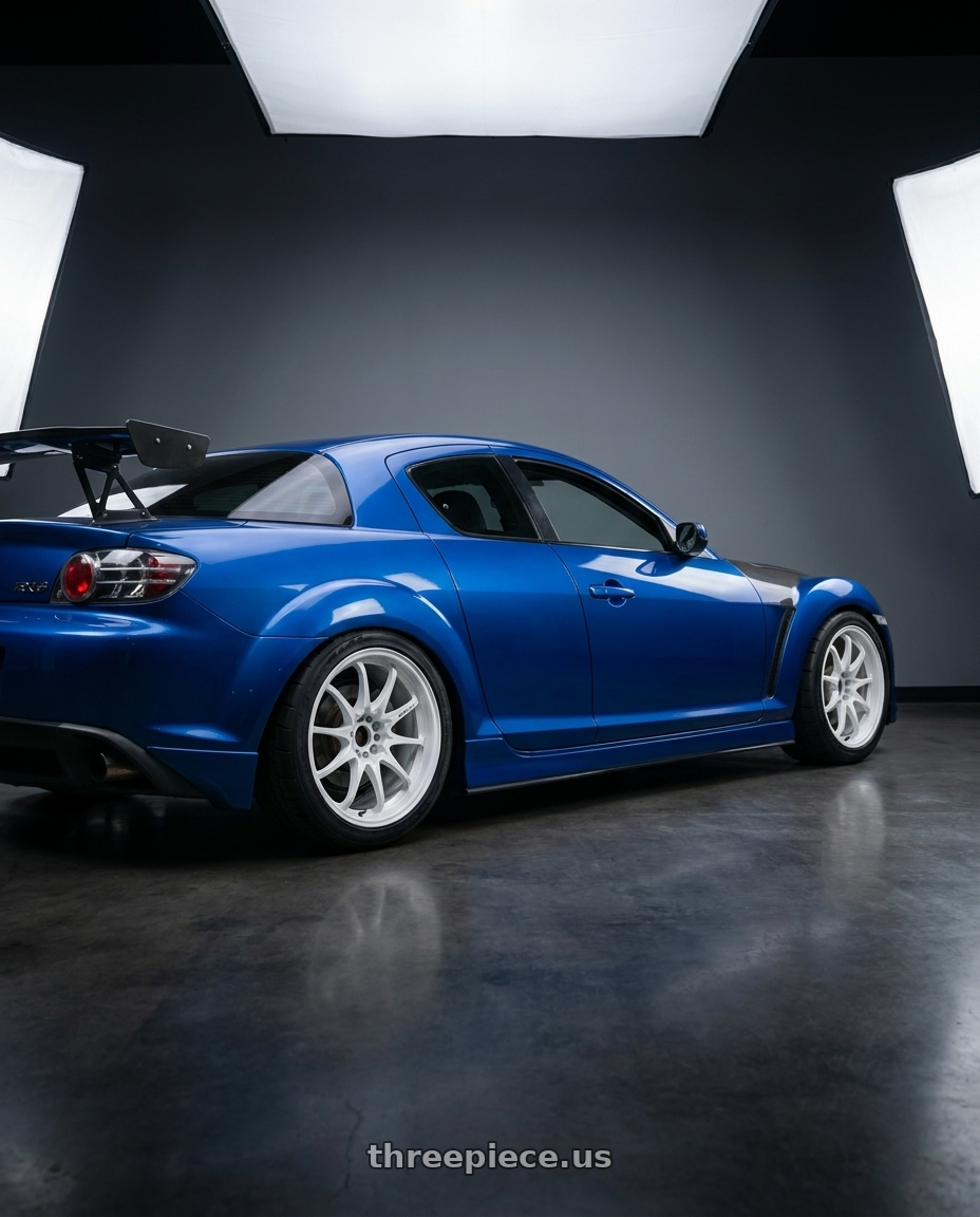 2005 mazda rx8 with Volk Racing CE28N-PLUS 5x114.3 18x9.5+22 Dash White wheels rear three quarter view square tires