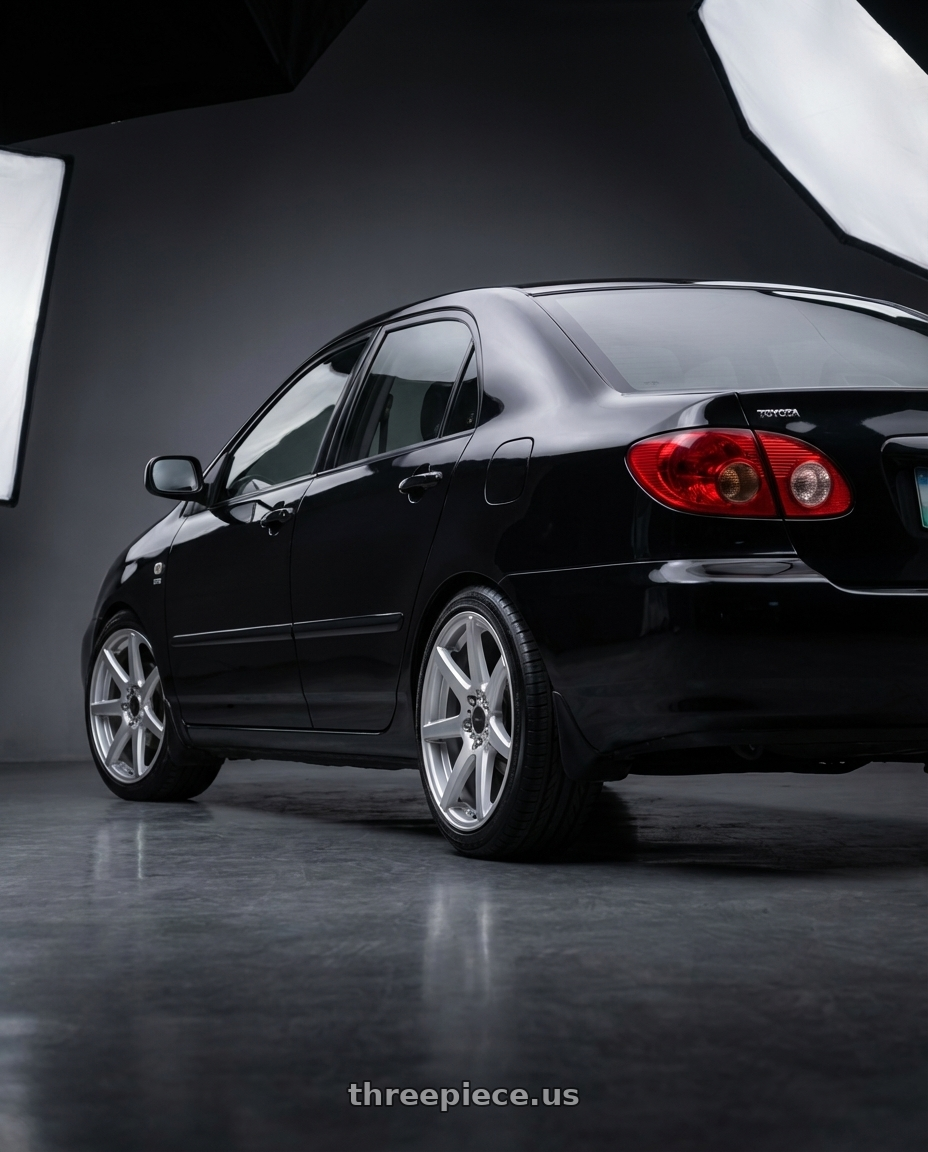 2006 Toyota Corolla Altis 1.6J with Raceline 131S Evo SMF 4X100/4X108 16x7 40 Silver and Machined wheels rear three quarter view square tires