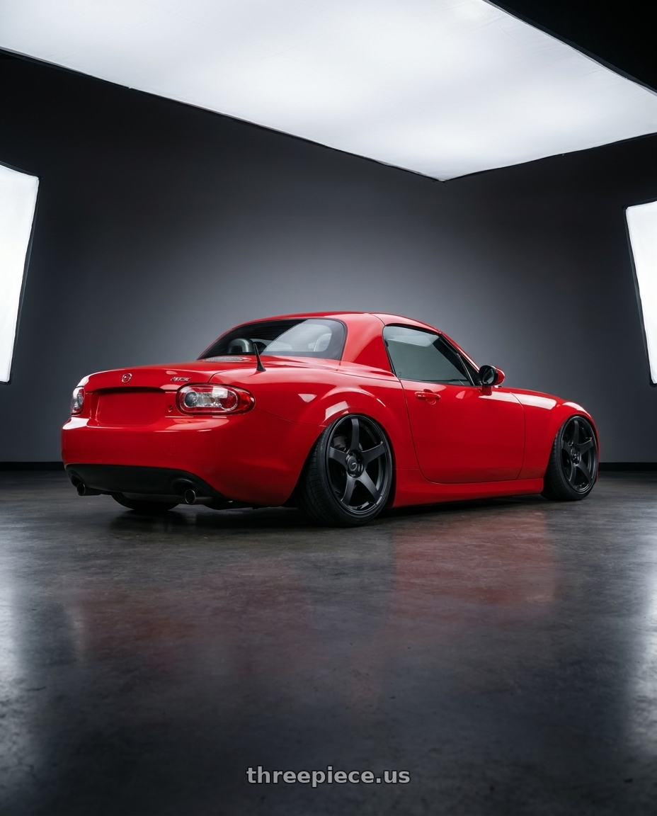 2012 Mazda MX-5 Miata NC with Ssr Gtv01 5x114.3 17x7+42  FLAT BLACK wheels rear three quarter view slight stretch tires