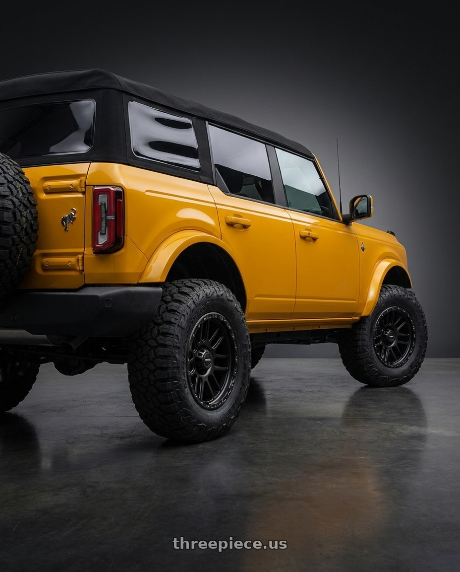 2024 Ford Bronco with Vision Off-Road 111 Nemesis 6x139.7 17x9-12 Matte Black wheels rear three quarter view meaty tires