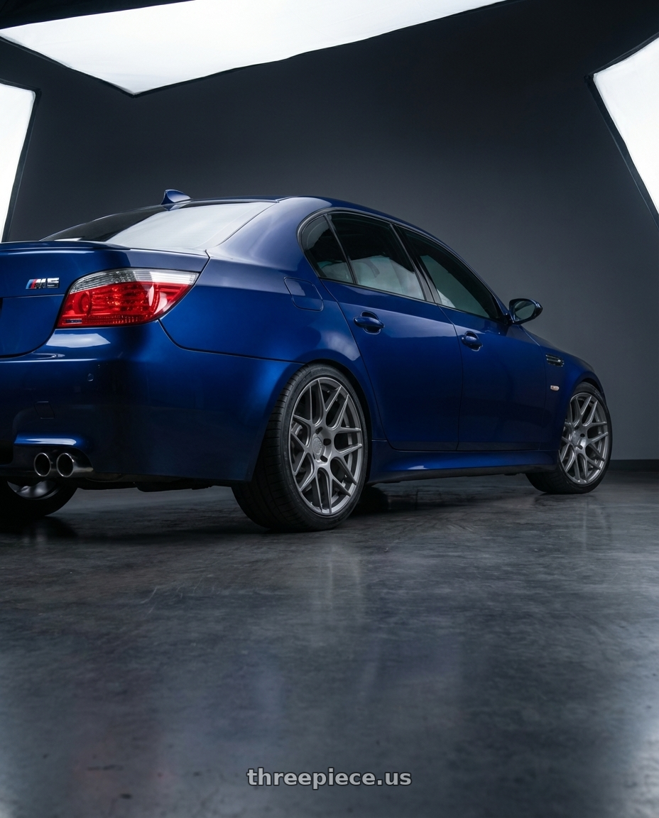 2010 BMW M5 E60 with Aodhan AFF2 5x120 19x8.5+35 Matte Gray wheels rear three quarter view square tires