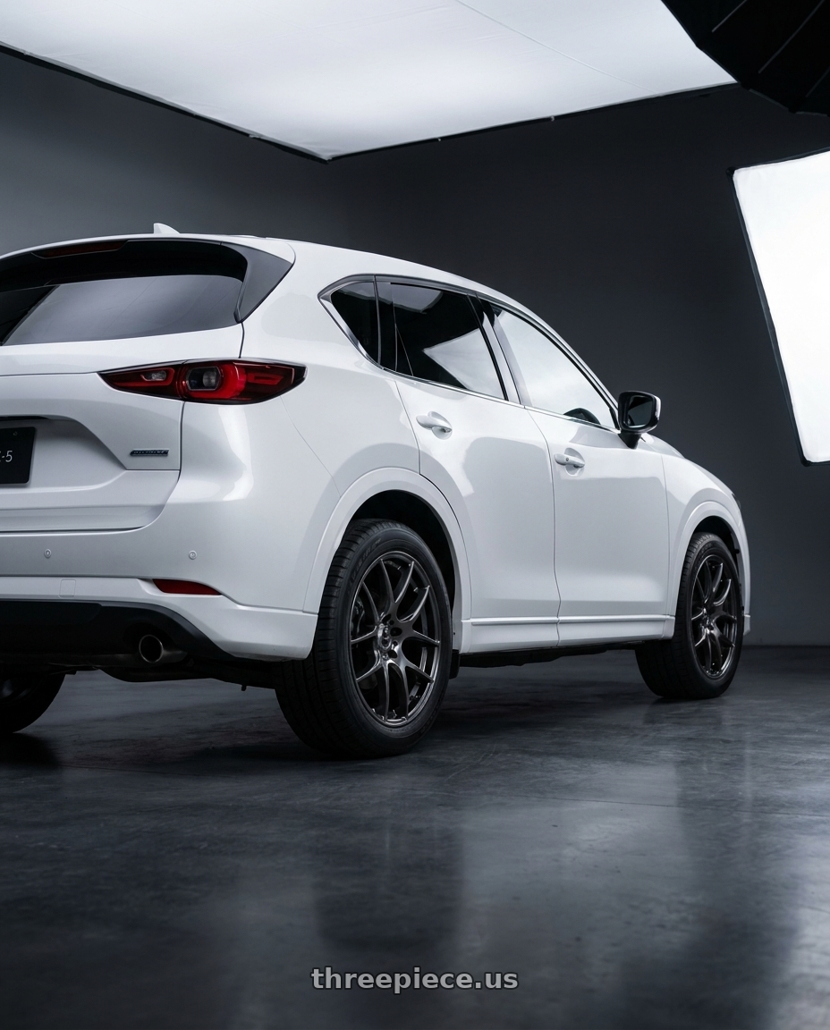 2025 MAZDA CX-5 20S PLUS with Work Emotion m8r 5x100 19x8.5 +45 Glim Black wheels rear three quarter view square tires