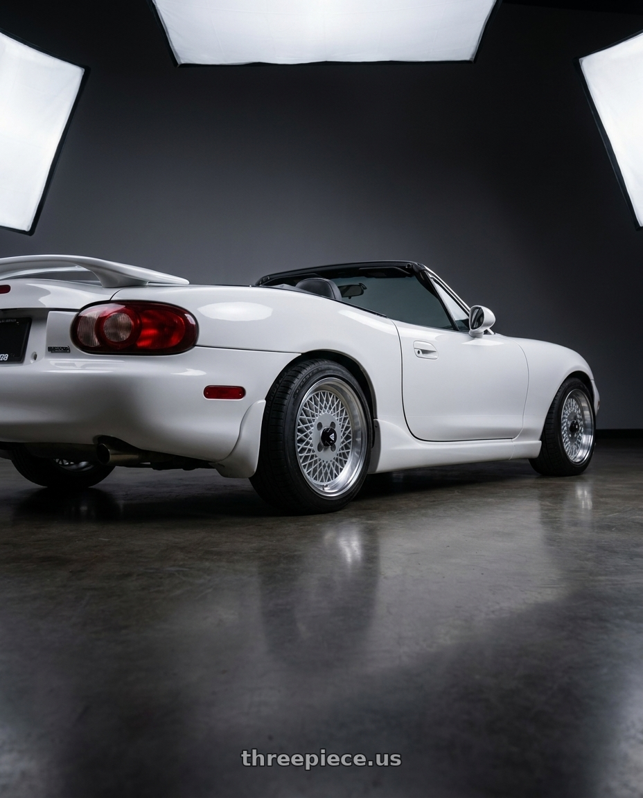 2003 Mazda Miata white with Enkei Enkei92 Classic Line 4x100 15x7+38 Silver wheels rear three quarter view square tires